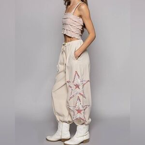 450 POL Off White Pink Star Patches Jogger Pants size Small